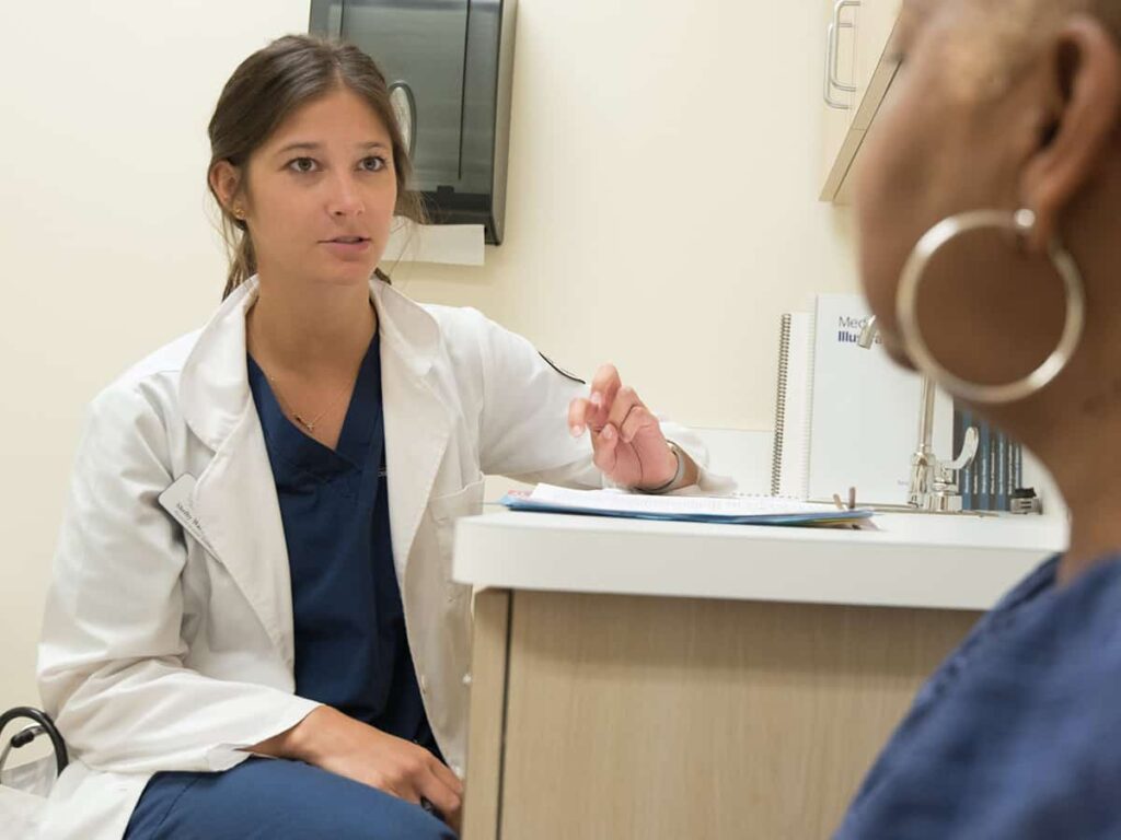 doctor discussing medicated treatment options with a patient