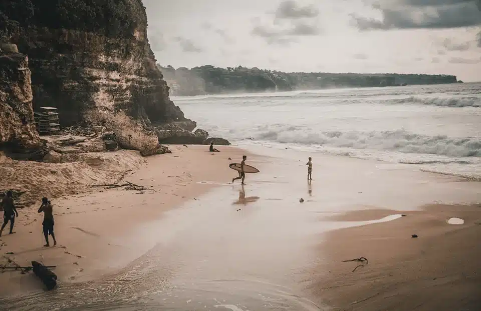 People running on a beach