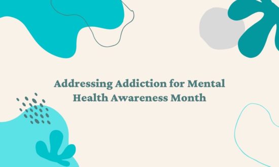 A photo of the text "Addressing Addiction for Mental Health Awareness Month" written in a bold font.