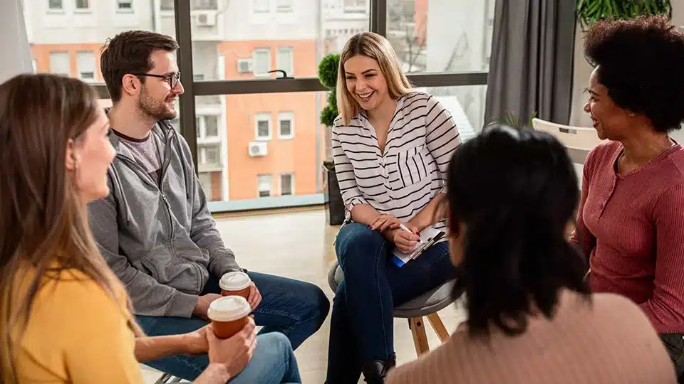 Group of friends sitting in circle