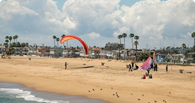 Kite surfers along the coast of the Newport Peninsula