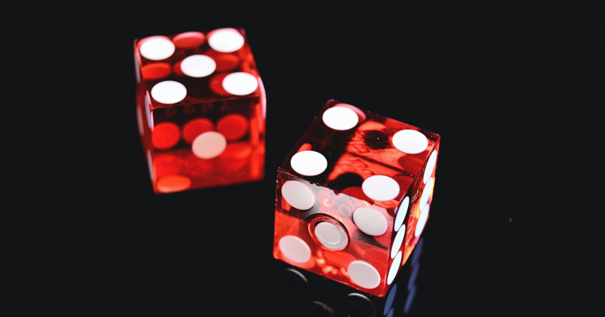 Overcoming Gambling Addiction: Two red dice representing risk, chance, and potential gambling problems. Support for a healthier future.