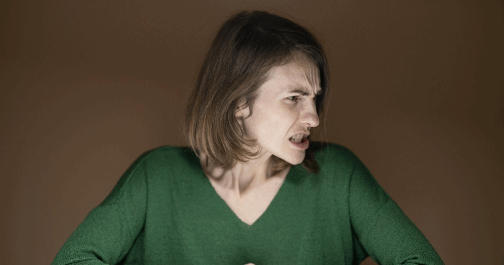 Angry woman experiencing Quetiapine withdrawal symptoms, showcasing challenges and solutions for managing the process.