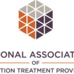 Logo featuring a 3D hexagonal cube made of orange, gray, and purple panels, with text beneath.