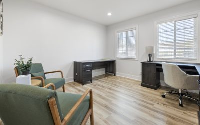 Opus Treatment Santa Ana office space featuring modern desks, comfortable seating, and natural light for a welcoming therapy setting.