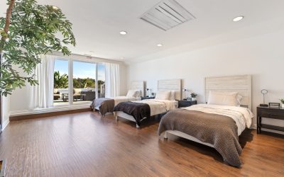 Bright inpatient room with three beds at Opus Treatment Santa Ana, promoting mental health and addiction recovery.